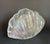 Here is a vintage iridescent glass shell napkin holder, likely dating to the mid-to-late 20th century. Formed in a...