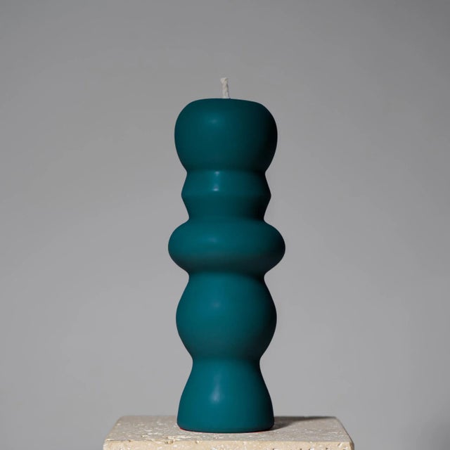 Hand-poured sculptural pillar candle inspired by postmodern design, made with 100% USA beeswax and a cotton wick. This...