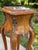 An elegant French Louis XV-style jardinière stand or pedestal, showcasing exquisite craftsmanship with beautifully...