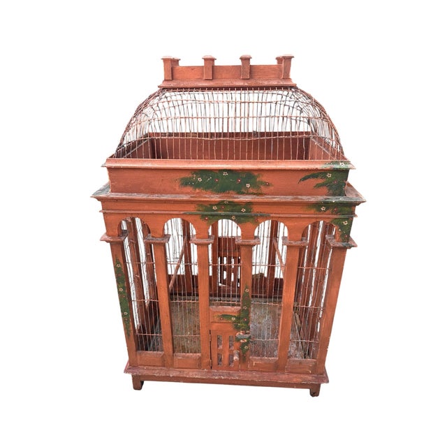 An exquisite antique French Victorian birdcage, richly adorned with delicate hand-painted detailing and graceful, romantic...