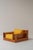 Striking Italian lounge chair from the 1970s, defined by its strong architectural wooden frame and low, relaxed...