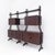 Original modular bookcase from the 1960s, made of rosewood veneer, with elegant lateral load-bearing uprights, also in...