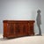 Victorian sideboard crafted in mahogany, featuring an elegant design with a broken front and projecting side blocks. The...