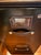 Handsome functional two drawer file cabinet wrapped in black leather with attractive contrasting white stitching. No key.