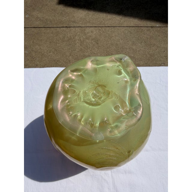This beautiful Art Glass Vase is hand blown decorative and functional glass with empahasis on form and Pattern. Glass is...