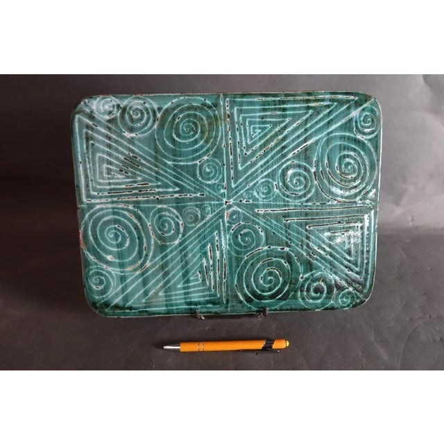 Ceramic dish in ceramic decorated with Robert Picault (1919-2000). This piece is remarkable by its dimensions unusual and...