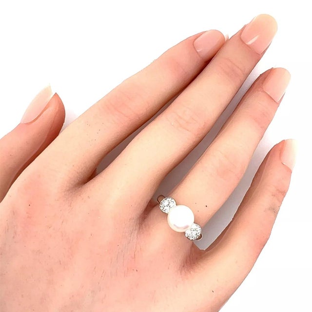 This elegant authentic ring is from Mikimoto, from 18k white gold with a polished finish featuring an 8mm lustrous white...