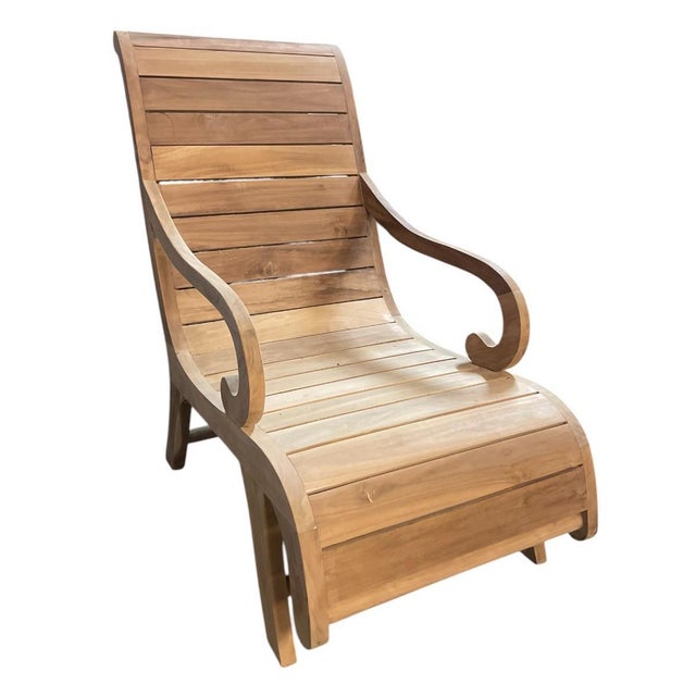 Elevate your outdoor oasis or sunroom with this striking vintage solid teak chaise lounge chair. Masterfully crafted with...