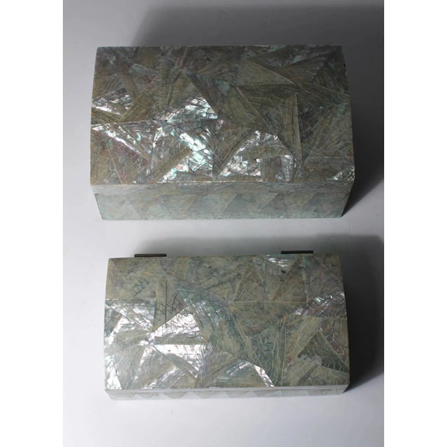 Pair of vintage crackled abalone jewelry boxes. Unmarked. Attributed to Maitland Smith. Measures: Larger box dimension: 7...