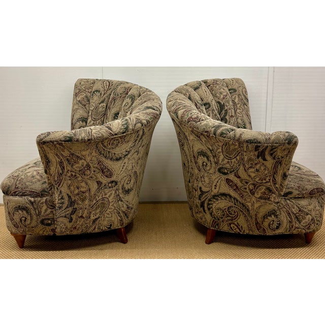 Pair of Vladimir Kagan Style channel-back fan-shaped club chairs featuring a distinct curved sloping silhouette sure to...