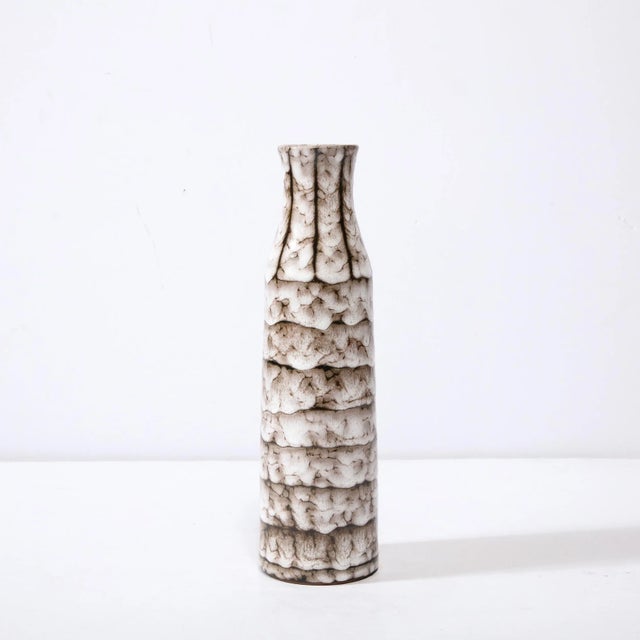 This Mid-Century Modernist Ceramic Vase With Banded Detailing is a beautiful example of Post War European Ceramics,...