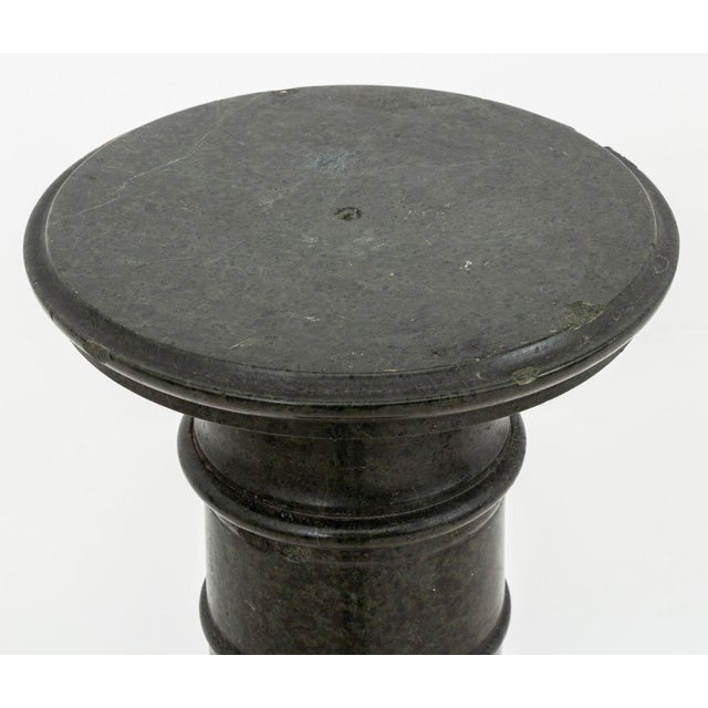 Victorian Green Serpentine Pedestal, late 19th century, with a circular revolving top on a tapering lapeted column, on an...