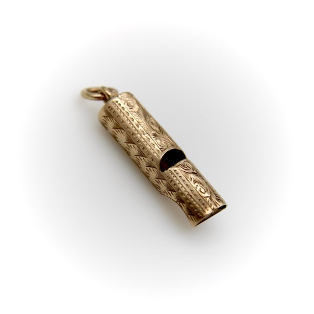 This Victorian 9k gold hand-engraved whistle makes a beautiful pendant—but is also a working whistle with a nice high...
