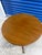 Classis vintage pedestal side table by Mersman, featuring a round mahogany-toned top, turned central pedestal and elegant...