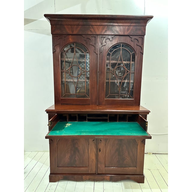 Stunning 19th century antique mahogany breakfront butlers secretary with cut work glass top cabinet and fold out desk....
