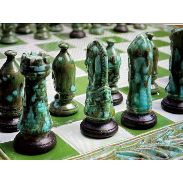 This is a fantastic mid century Italian Majolica Chess Set. This is a two tone melon and mint green ceramic Chess board in...