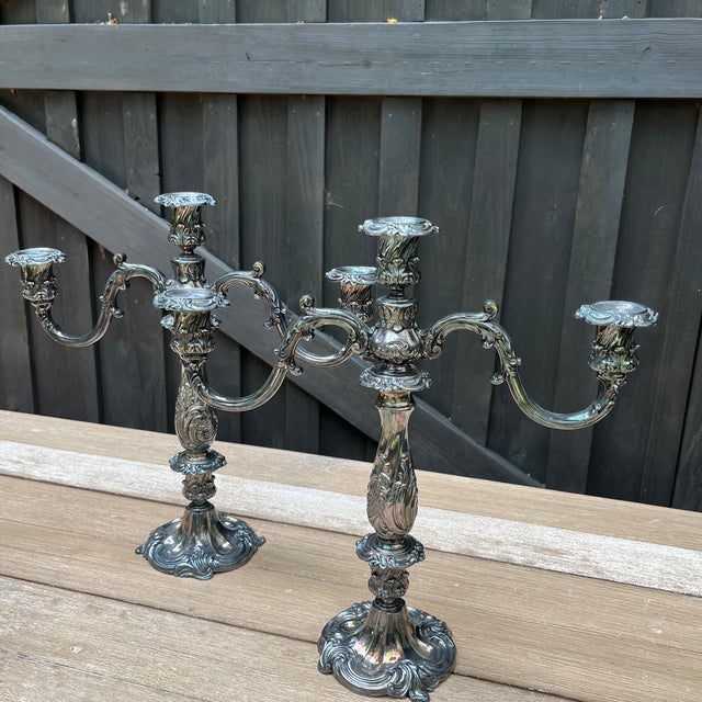 Love at first sight!Elevate your space with this stunning pair of vintage Reed & Barton 741 silverplate candelabras....