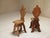 Renaissance revival elegance, this exceptional pair of 19th-century sgabello hall chairs, expertly crafted in richly...