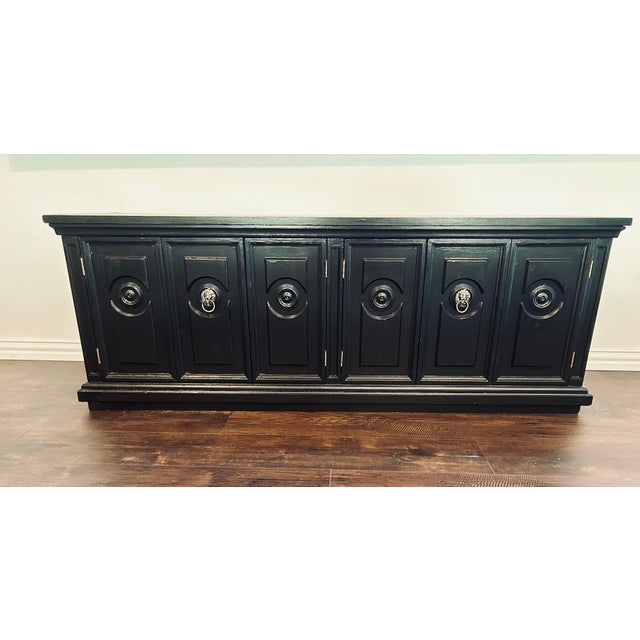 Vintage 1970’s solid oak wood TV / console table with 6-panel cabinet doors. Ample storage for a variety of items like...