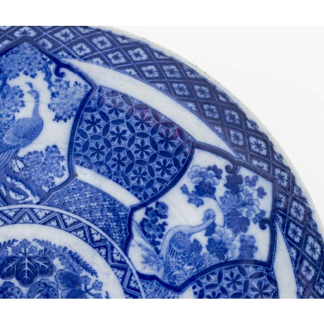 Japanese Blue and White Porcelain Transferware Charger, with swan, peacock, and heron vignettes, unmarked. 2.25" H x 18"...