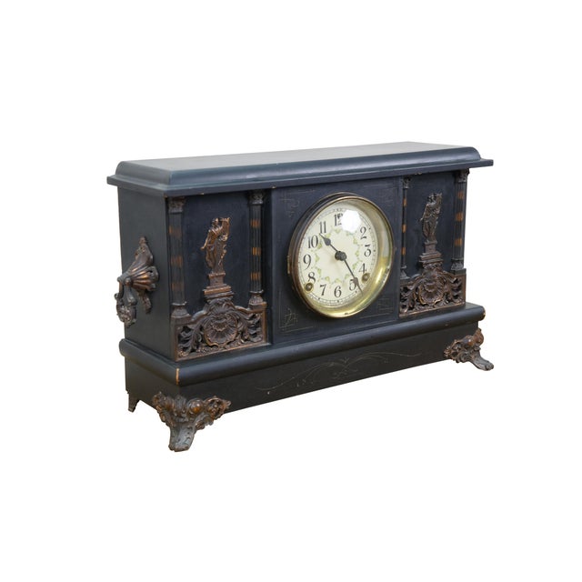 Antique Victorian Sessions Clock Company key wound, chiming mantel clock. Black lacquered wood finish with lightly etched...