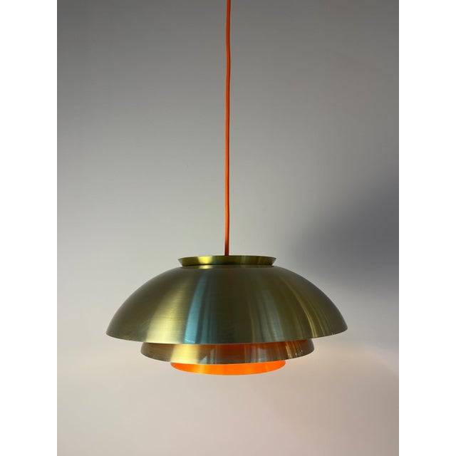 This Danish louvered lamp from the mid-century era is a true masterpiece of lighting design, bringing an extraordinary...