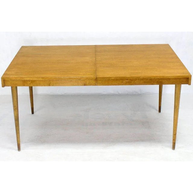 Edmond J. Spence Mid century modern blond birch dining table with two 14" long leaves.