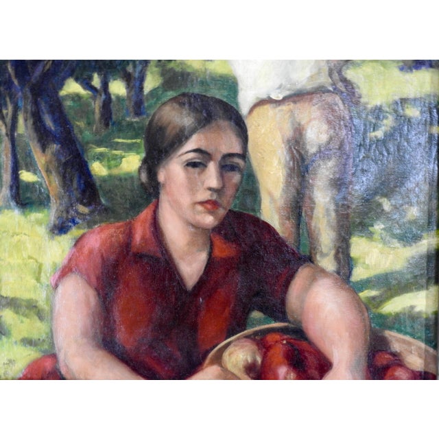 Workers are gathering the apples in this early 19th century oil on canvas painting. Vibrant colors add to the beauty of...