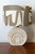 Pair of round travertine lamps, decorated with recessed concentric circles. Italian work, circa 1960/1970, attributed to...