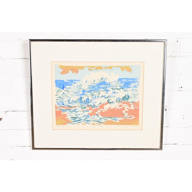 A beautiful framed coastal scene serigraph Entitled "Frolicking Surf" By Dorothy J. Adams USA, Late 20th Century Measures:...