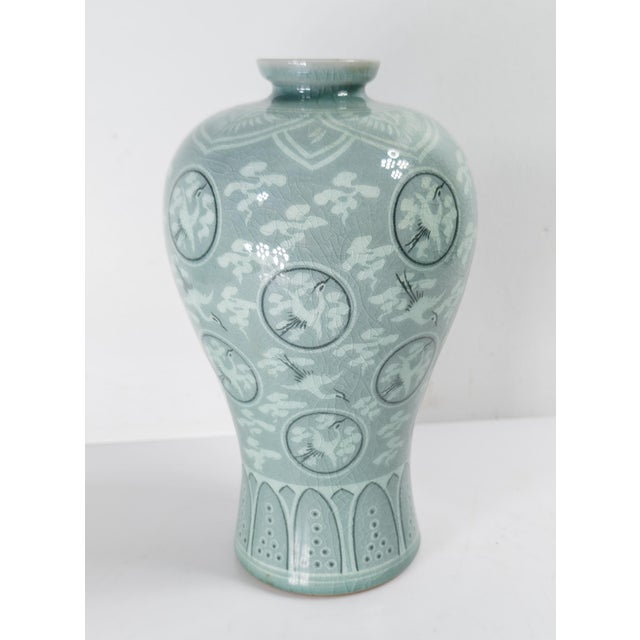 We are selling this attractive Mid-Century Korean vase. This vase is done in Goryeo Joseon style celadon glaze with soft...
