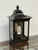 Design Plus Gallery presents a Small Burnished Metal Pagoda Wall Sconce. The sconce has the ability to sit upright on a...
