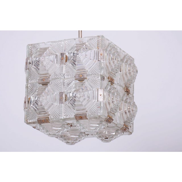 Maker: Kamenický Šenov This stylish and highly elegant chandelier, originating from the 1960s from Czechoslovak production...