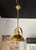 This gorgeous nautical-inspired pendant light is a great way to bring some coastal aesthetic into your home. The piece...