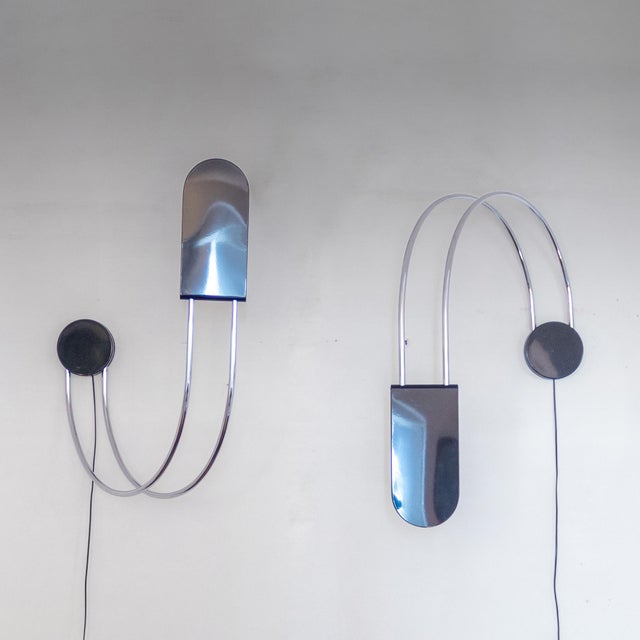 Pair of “Gesto” Wall Sconces, Bruno Gecchelin for Skipper, 1970s Unique and essential design with strong presence and...