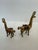 Capture a piece of Mid-Century Andean charm with this delightful pair of vintage brass llama figurines. These stylized...