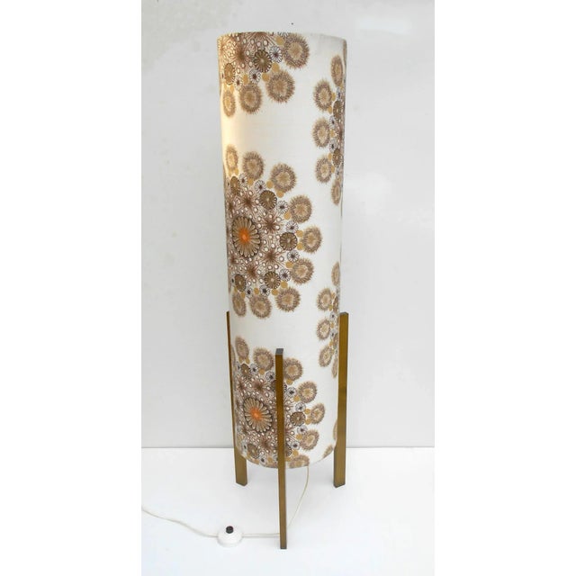 This cardboard lamp with a floral fabric wrapped shade was designed by Bruno Munari in Italy during the 1960s. The piece...