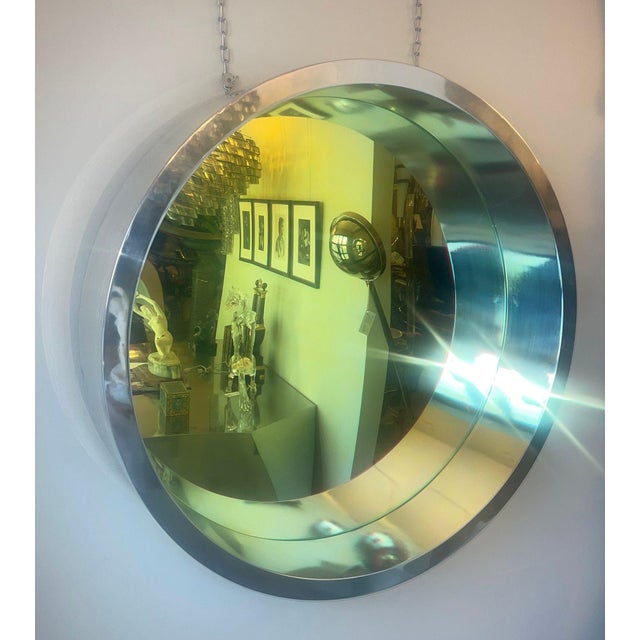 Important sculptural wall mirror by George Ernstson (American, 1945–2011), titled Large Portal Yellow, circa 2004. The...