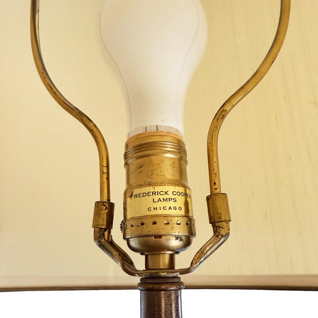 A striking vintage neoclassical urn table lamp by celebrated American lighting maker Frederick Cooper of Chicago. Grand in...