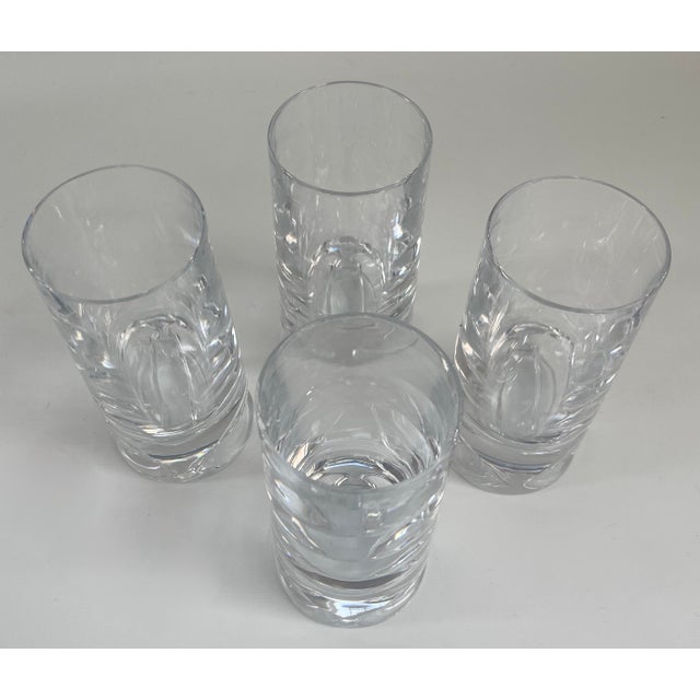 Set of four groove highball glasses by Nambe. Also suitable to drink hot beverages including hot chocolate. In excellent...