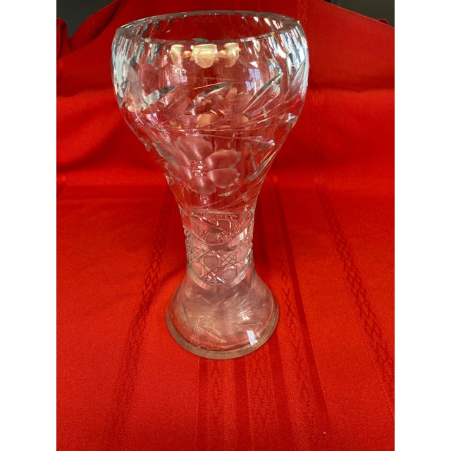 This is a beautiful, ornate cut crystal flower vase that belonged to my grandmother. In pristine condition with no cracks...