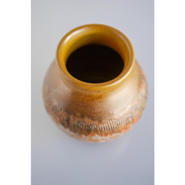 A very nice vintage ceramic vase from Tilgmans, Sweden. It has a very robust and lovely shape, yet it is the glazing that...