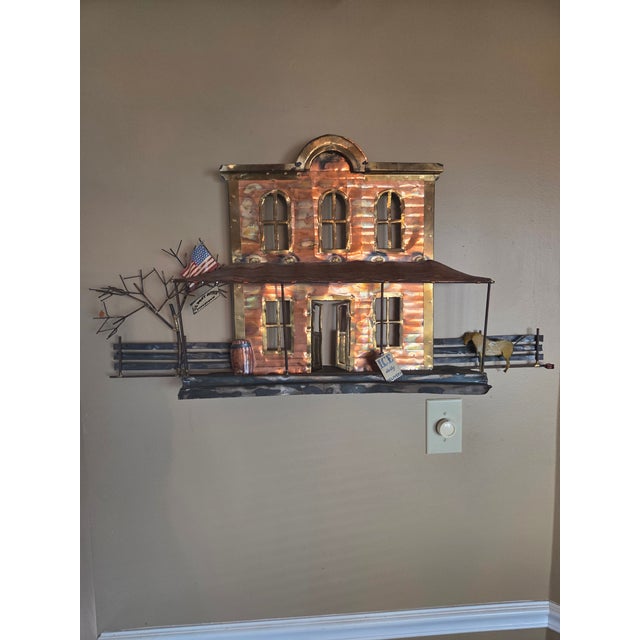 A spectacular, Brutalist mixed-metal wall sculpture depicting a rustic post office. Rendered in the distinct mid-century...