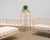 A chic organic modern four-tiered étagère or plant stand made by artisans at McGuire, San Francisco, CA. The rare piece...