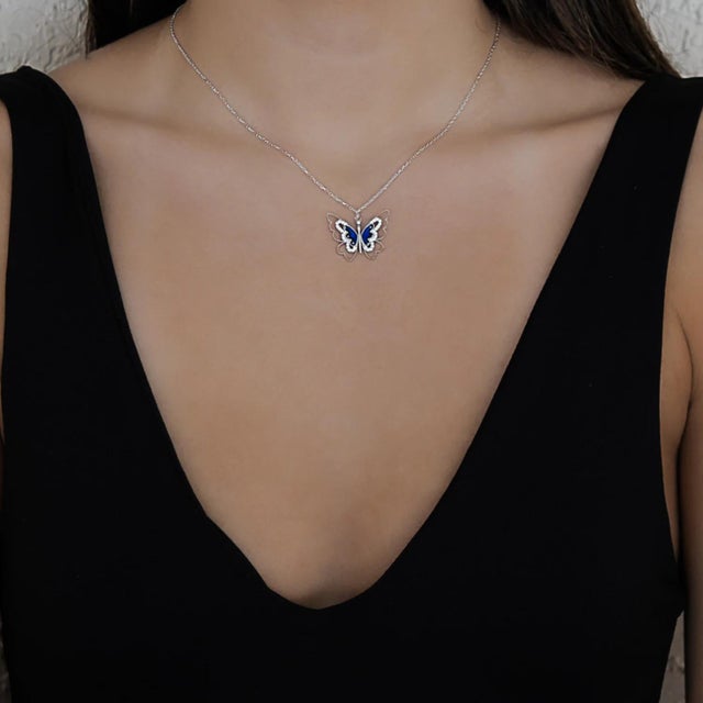 The Spiritual Transformation Blue Butterfly Necklace, serves as a powerful symbol of personal growth, reminding us that...