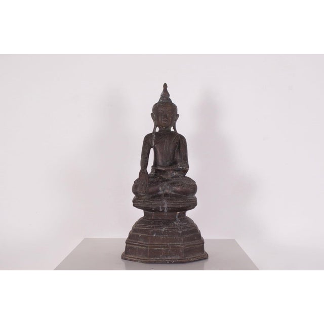 Bronze buddha, depicted seated, in bhumisparsha mudra. burma (myanmar), shan kingdoms late 19th / early 20th century....