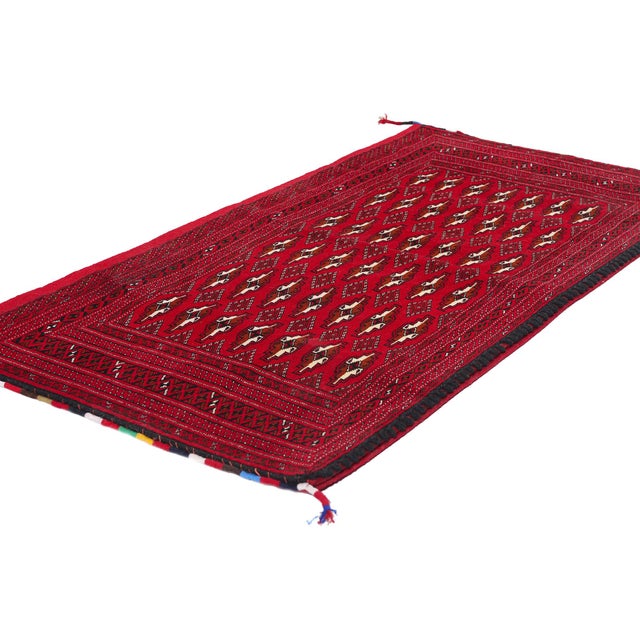 78909 Vintage Persian Turkoman Rug, 02'04 x 04'06. This mesmerizing hand-knotted wool vintage Persian Turkoman rug...