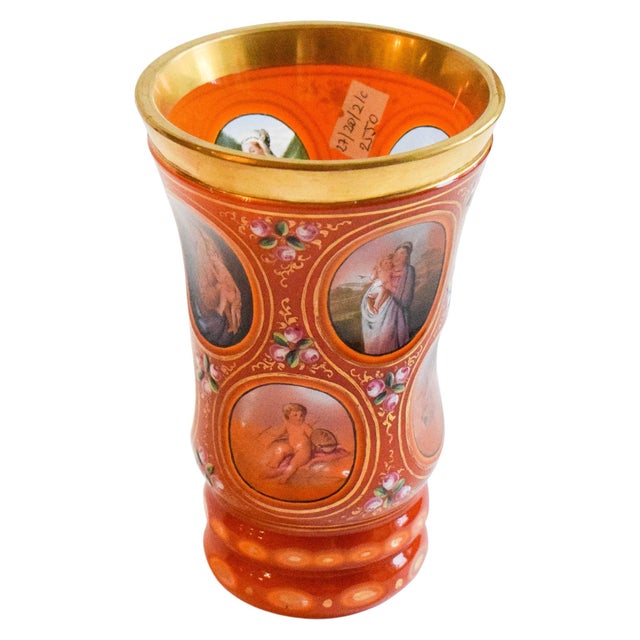 A beautiful, richly decorated cup, an example of Biedermeier-style glassware. The cup is made of layered crystal glass –...