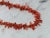 30" necklace with delicate looking coral branches. The age could be older. Purchased in an unused condition. Some call...