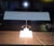 This is a vintage "Sightmaster" style fluorescent desk lamp likely manufactured by the Art Specialty Company of Chicago,...